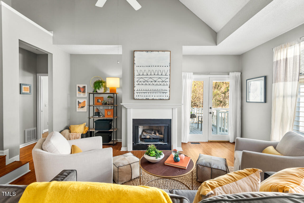 125 Legacy Lane Durham, NC 27713 - Photo 2 of 37 a living room with furniture fireplace and a window