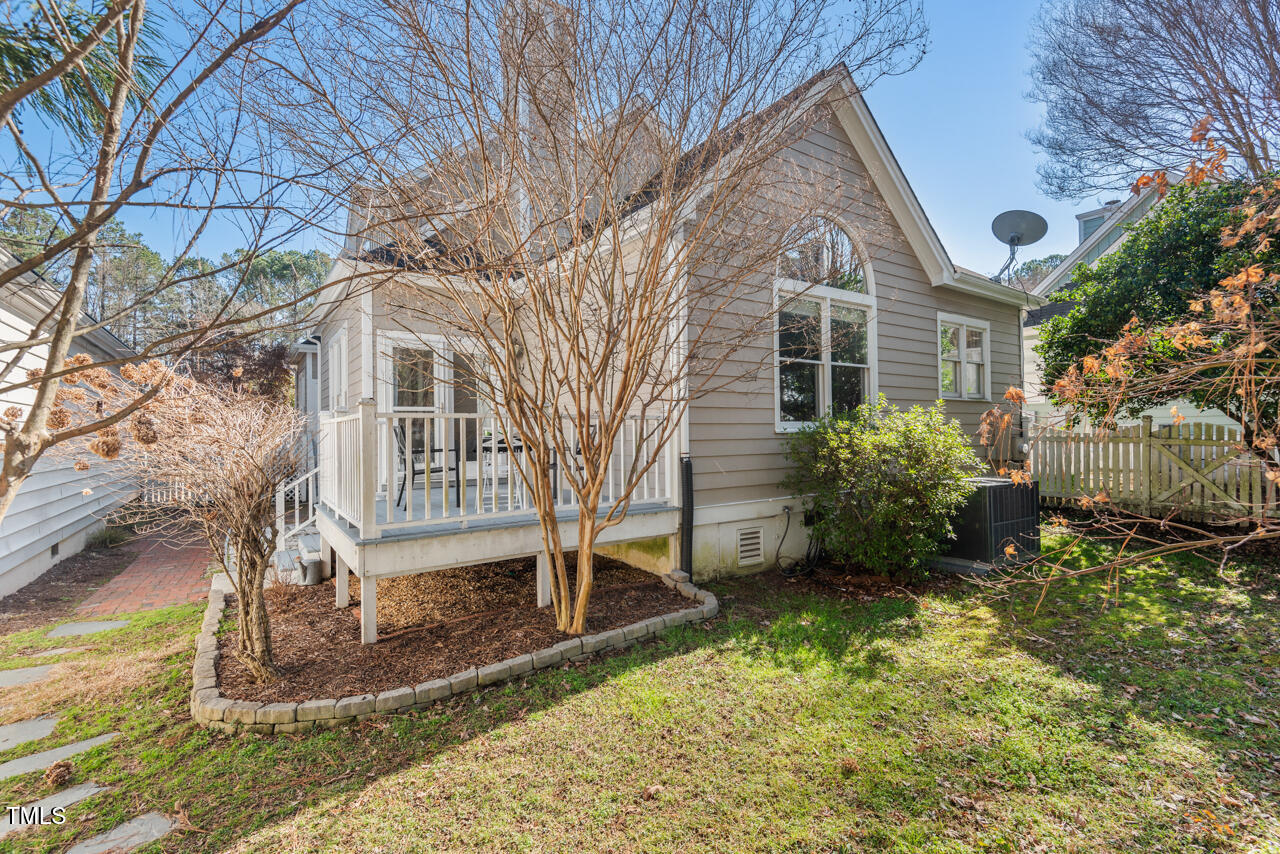 125 Legacy Lane Durham, NC 27713 - Photo 30 of 37 a front view of a house with garden