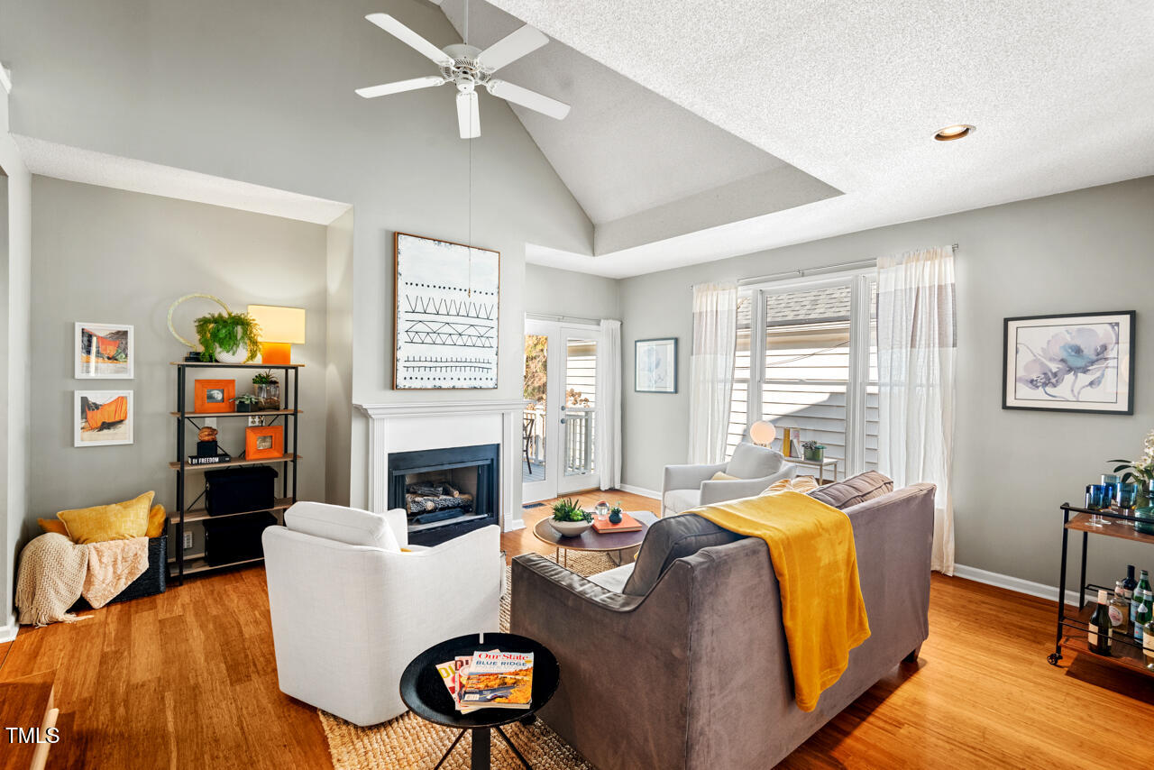 125 Legacy Lane Durham, NC 27713 - Photo 3 of 37 a living room with furniture fireplace and a window