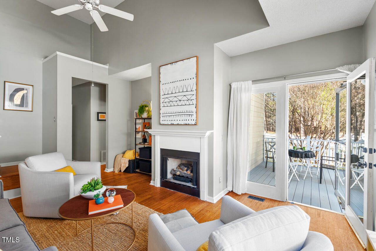 125 Legacy Lane Durham, NC 27713 - Photo 7 of 37 a living room with furniture and a fireplace