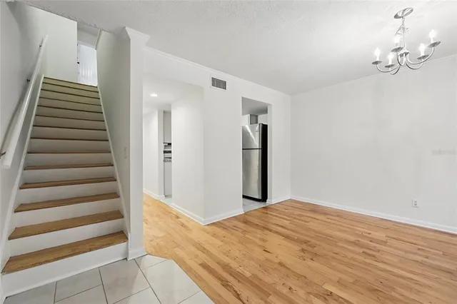 a view of a room with a staircase