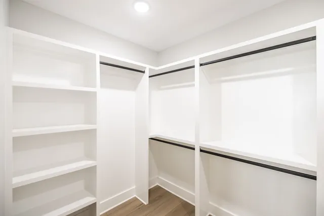 a view of an empty walk in closet