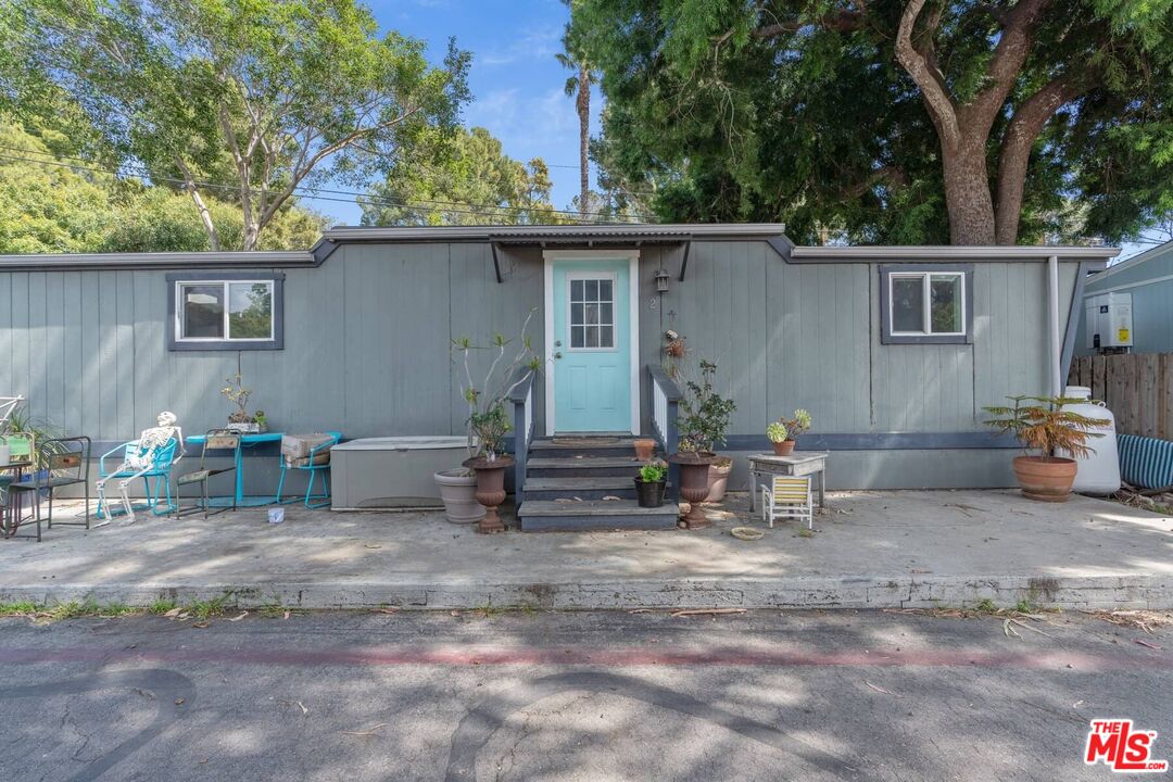 2 Paradise Cove Road Malibu, CA 90265 - Photo 14 of 24 a view of a chair and table in backyard of the house