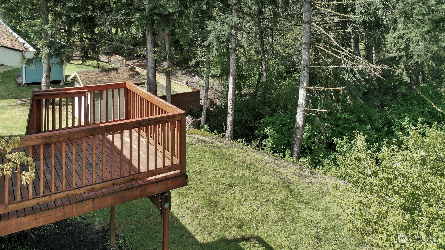 818 Haskell Street DuPont, WA 98327 - Photo 20 of 26 a view of backyard with deck and outdoor seating