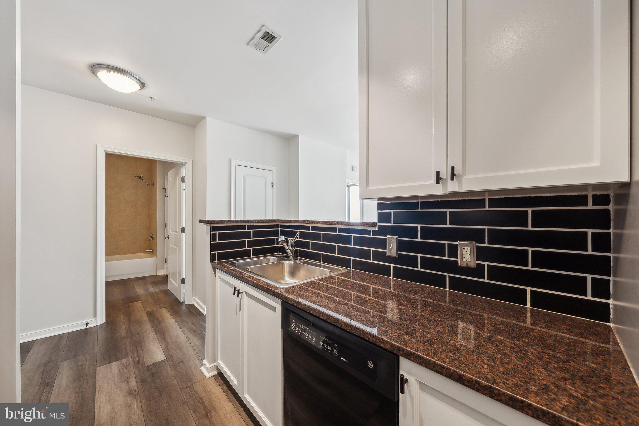 851 North Glebe Road, Unit 2008 Arlington, VA 22203 - Photo 11 of 37 Modern kitchen with sleek finishes.