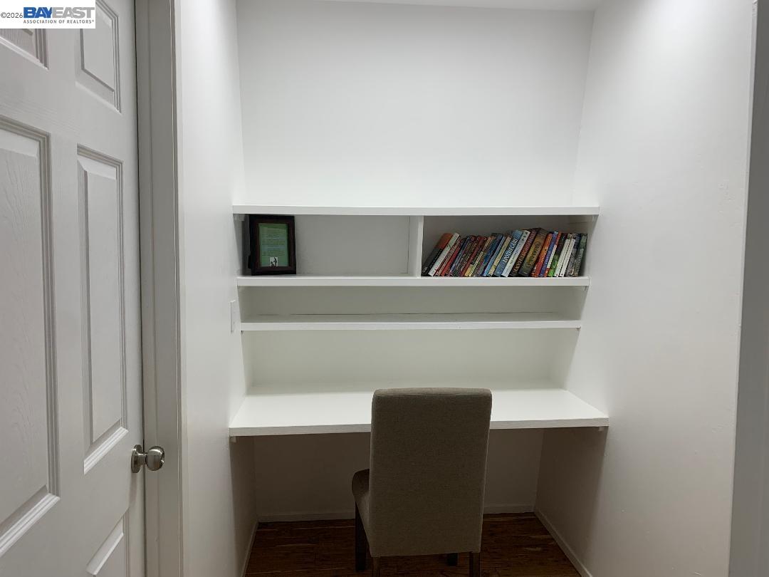 4515 Ewing Road Castro Valley, CA 94546 - Photo 21 of 41 a workspace with a bookshelf