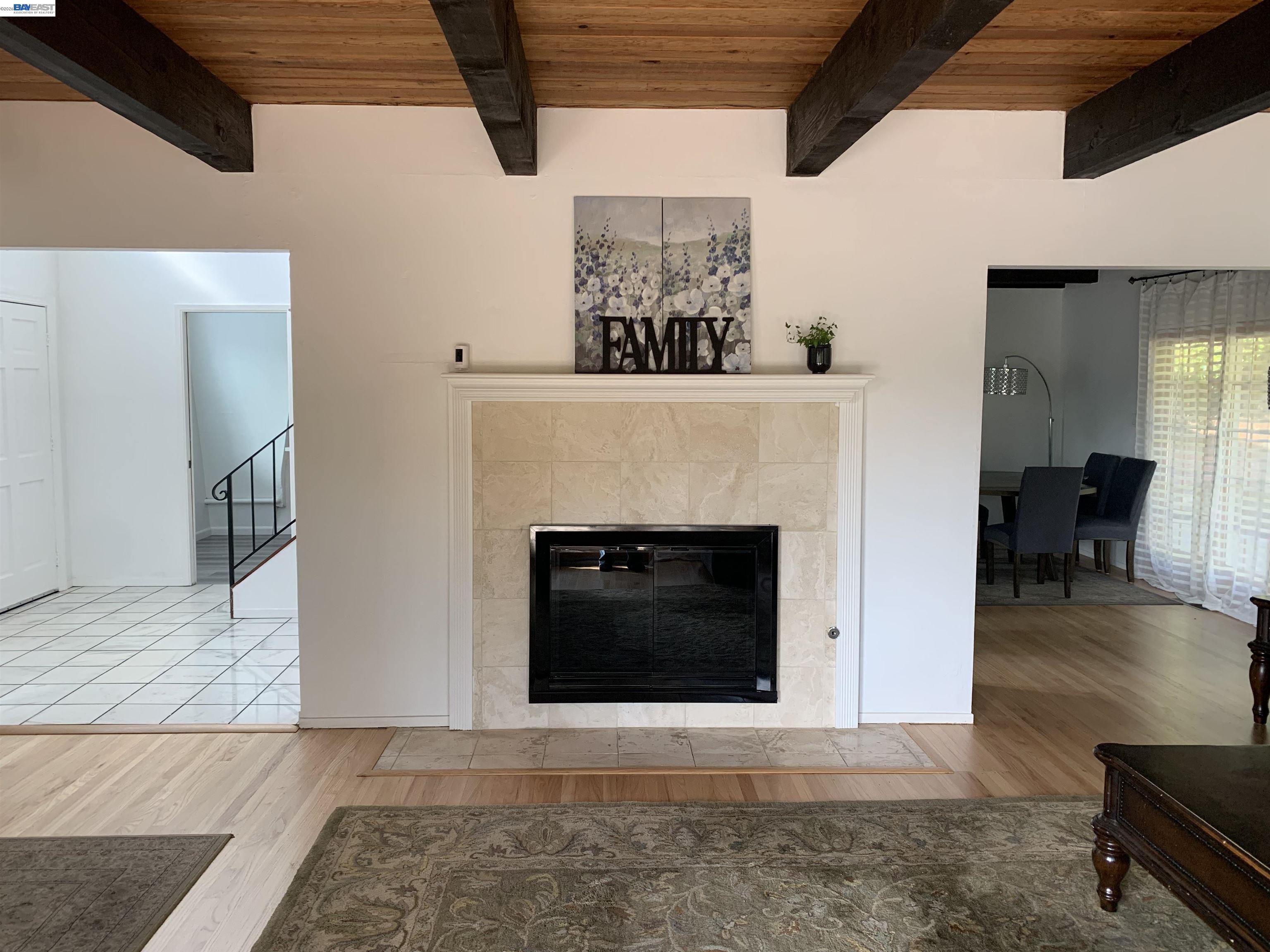 4515 Ewing Road Castro Valley, CA 94546 - Photo 9 of 41 a living room with furniture and a fireplace