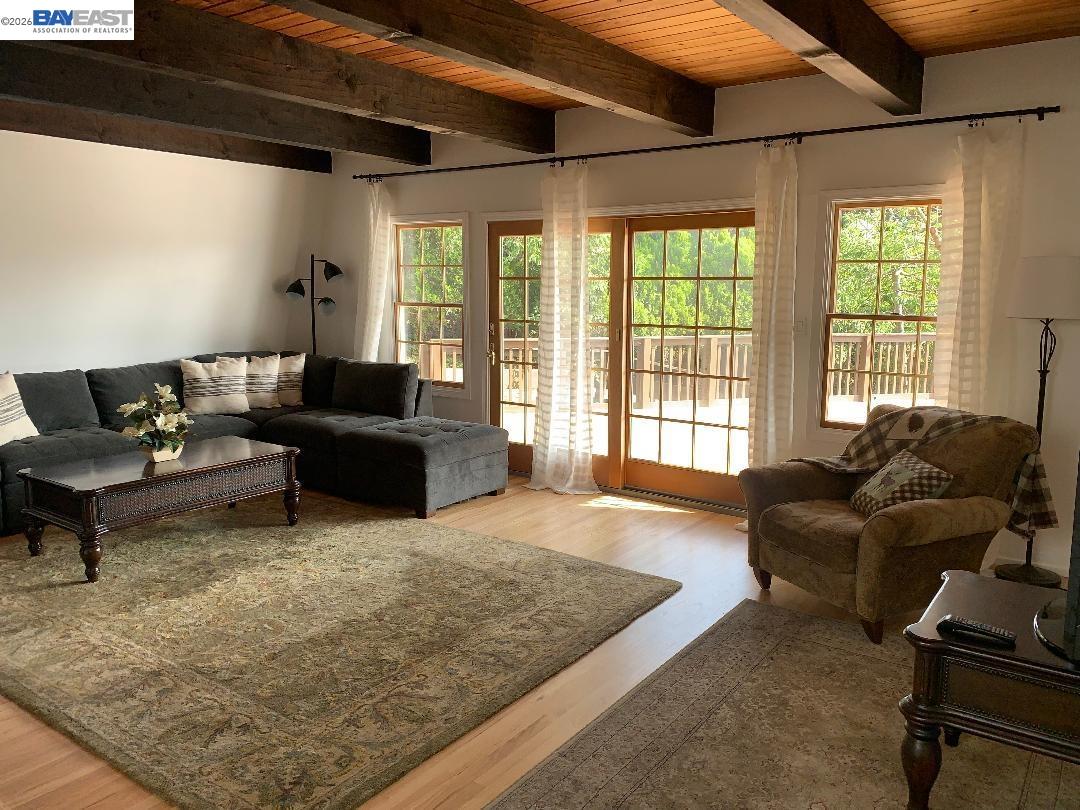 4515 Ewing Road Castro Valley, CA 94546 - Photo 10 of 41 a living room with furniture and a rug