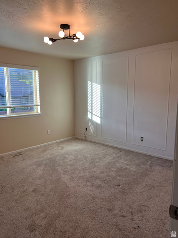 2001 Fielding Hill Lane Draper, UT 84020 - Photo 11 of 21 Carpeted empty room featuring a textured ceiling