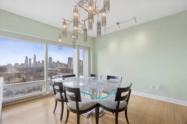 a view of a dining room with furniture window and outside view