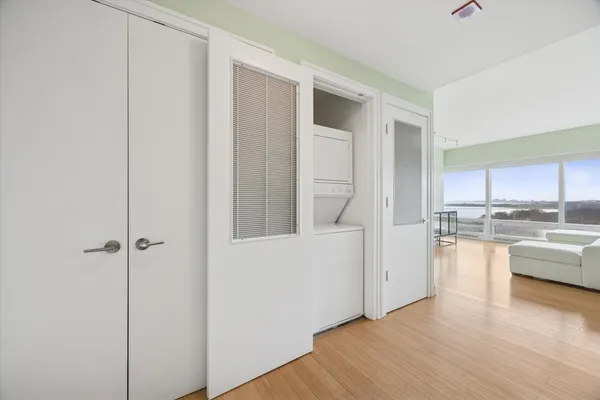 a view of kitchen with wooden floor