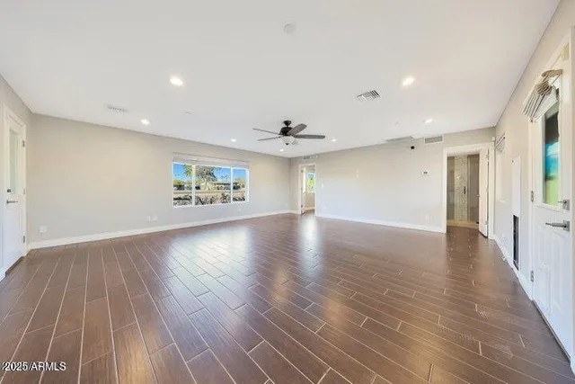 a kitchen with stainless steel appliances granite countertop a sink and cabinets