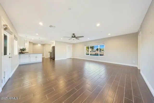a view of a kitchen with electric appliances
