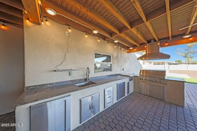 a view of a livingroom with furniture and a ceiling fan