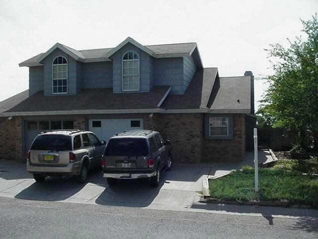a car parked in front of a house
