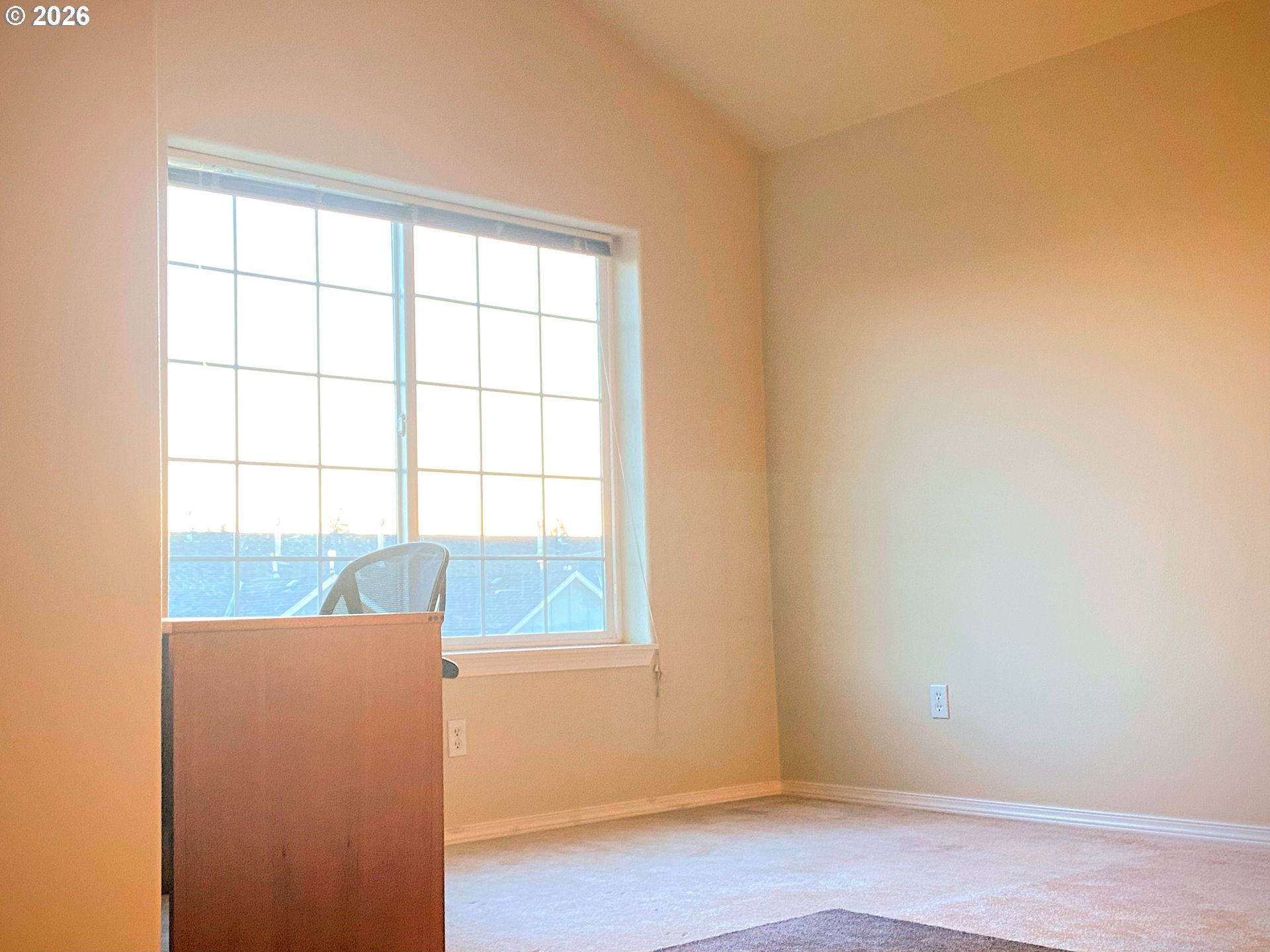 17446 Southwest October Court Beaverton, OR 97003 - Photo 11 of 21 an empty room with wooden floor and windows