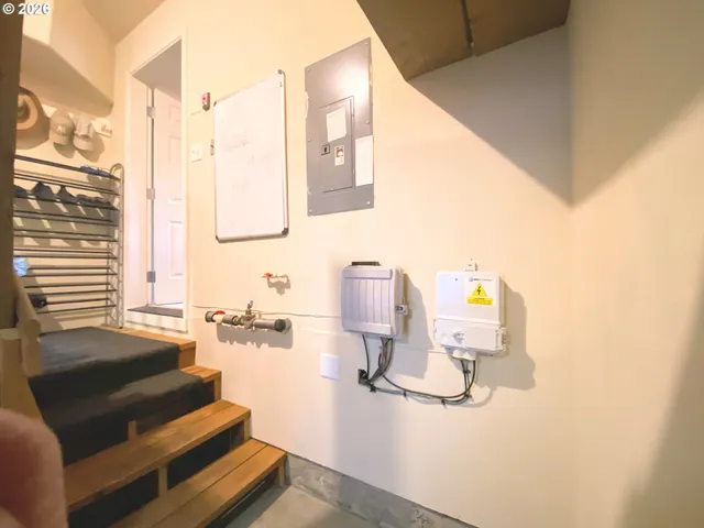 a front view of a residential apartment building with a yard