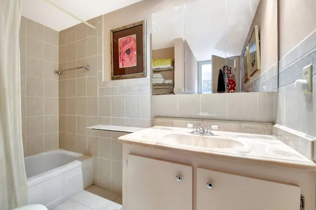 a bathroom with a sink and a bathtub