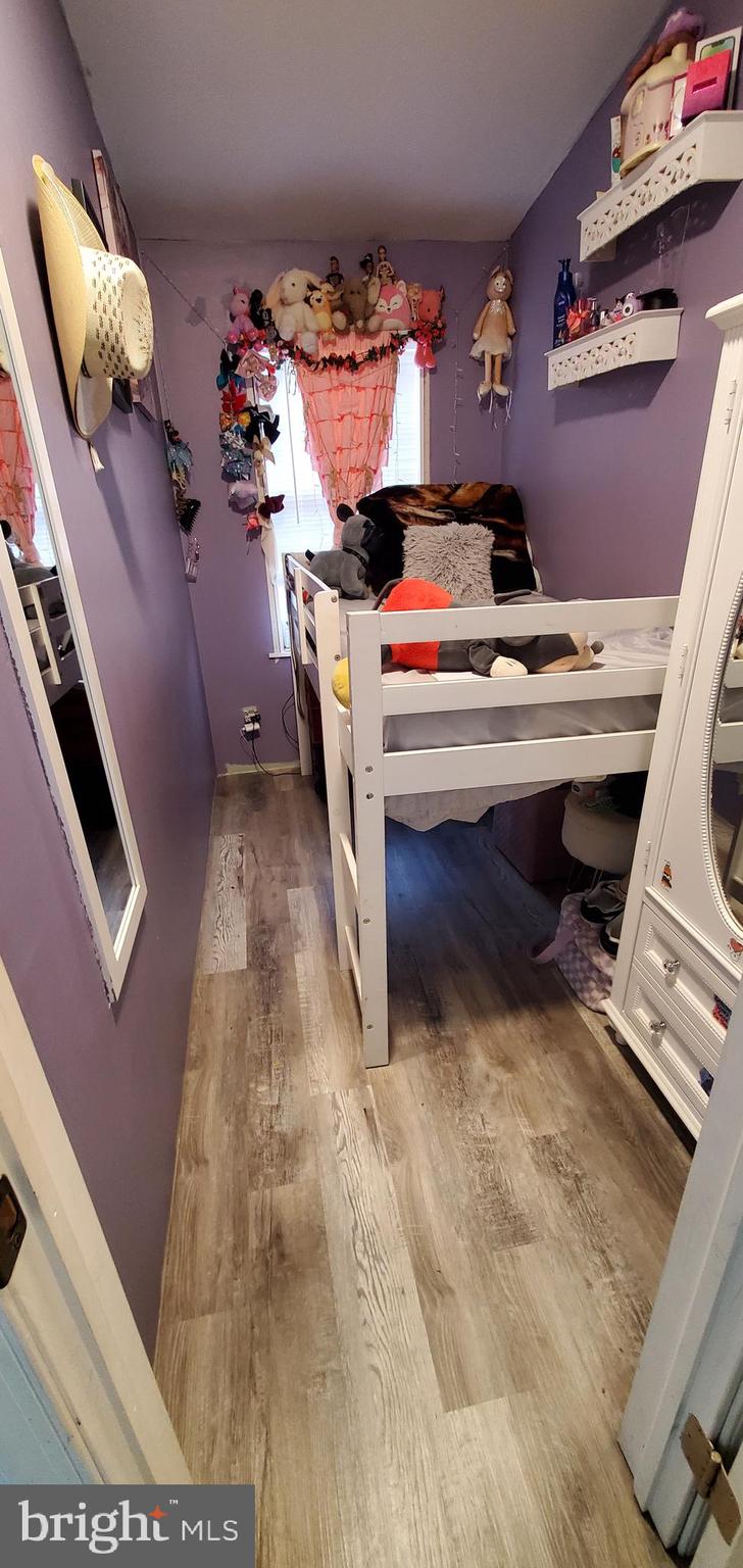 13 Springway Conowingo, MD 21918 - Photo 11 of 22 a room with a washing machine and storage