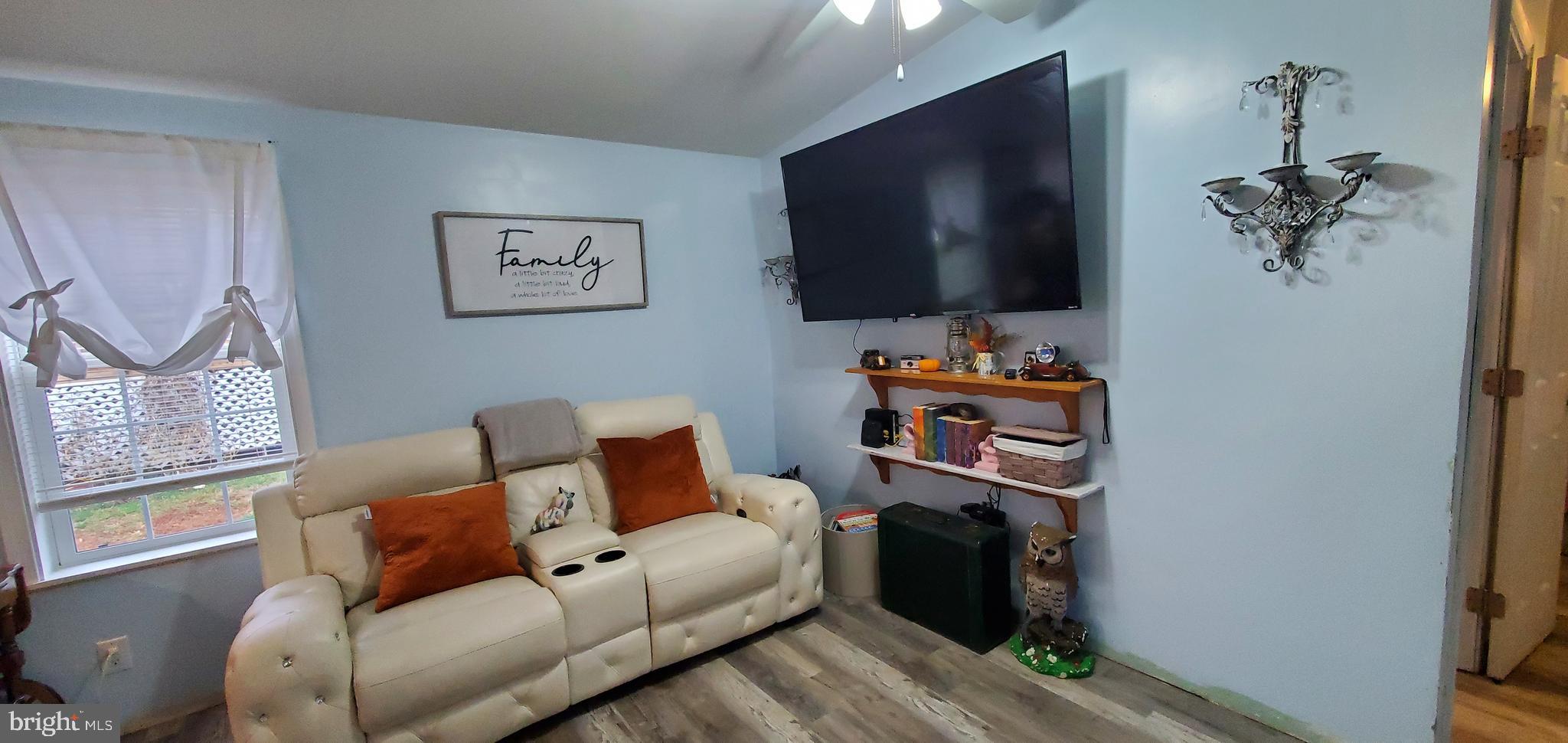 13 Springway Conowingo, MD 21918 - Photo 2 of 22 a living room with furniture and a flat screen tv