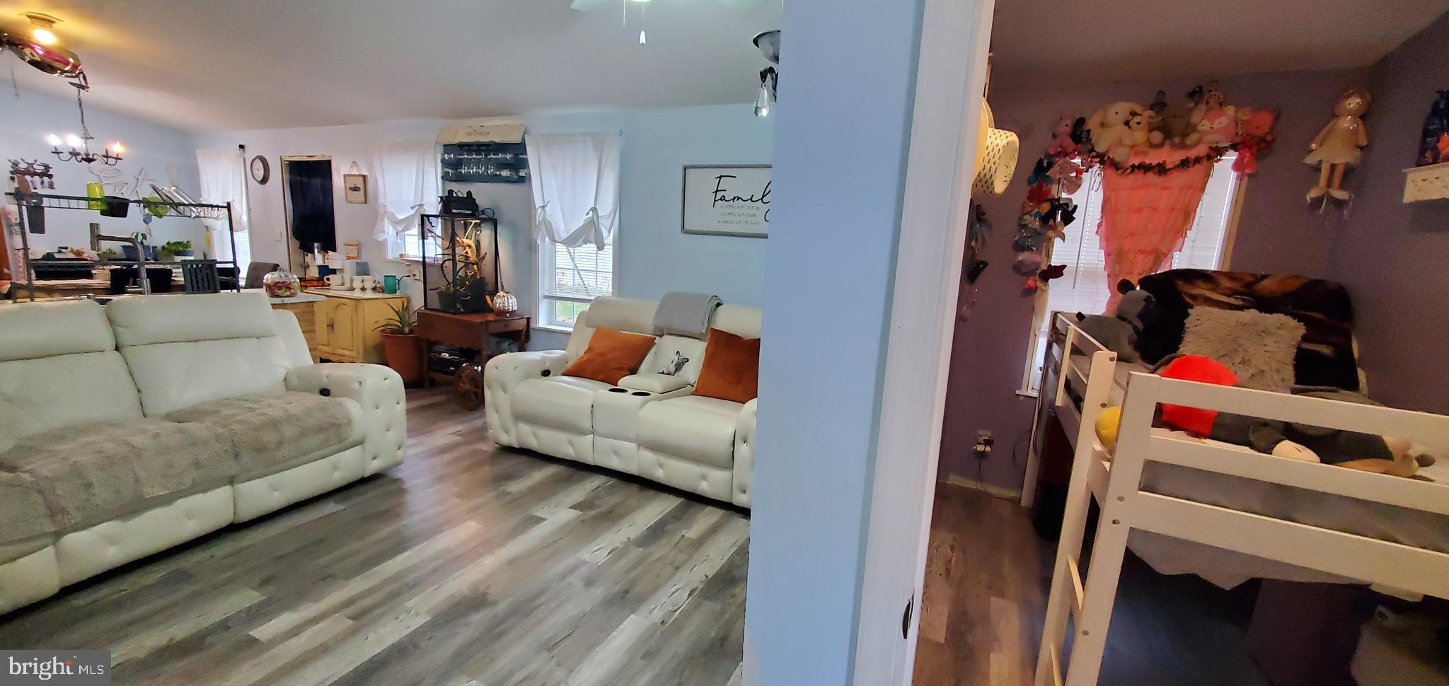 13 Springway Conowingo, MD 21918 - Photo 3 of 22 a living room with furniture and a couch