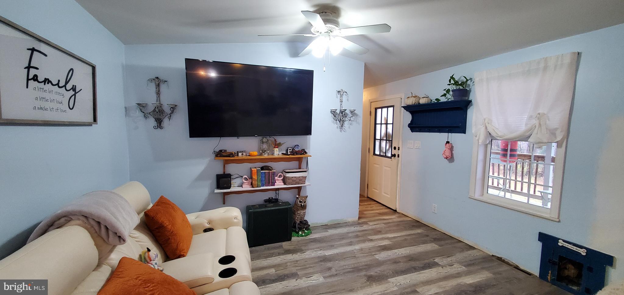 13 Springway Conowingo, MD 21918 - Photo 4 of 22 a living room with furniture and a flat screen tv