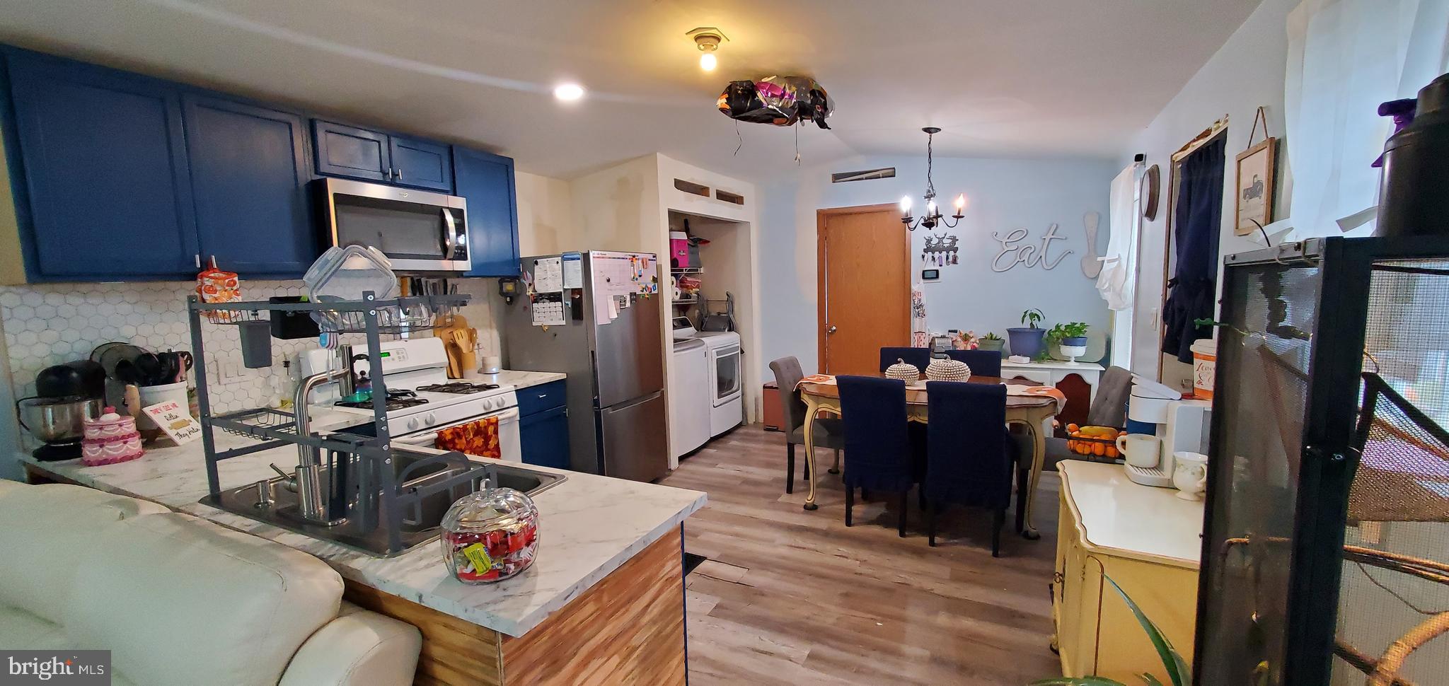 13 Springway Conowingo, MD 21918 - Photo 5 of 22 a living room filled with furniture and a flat screen tv