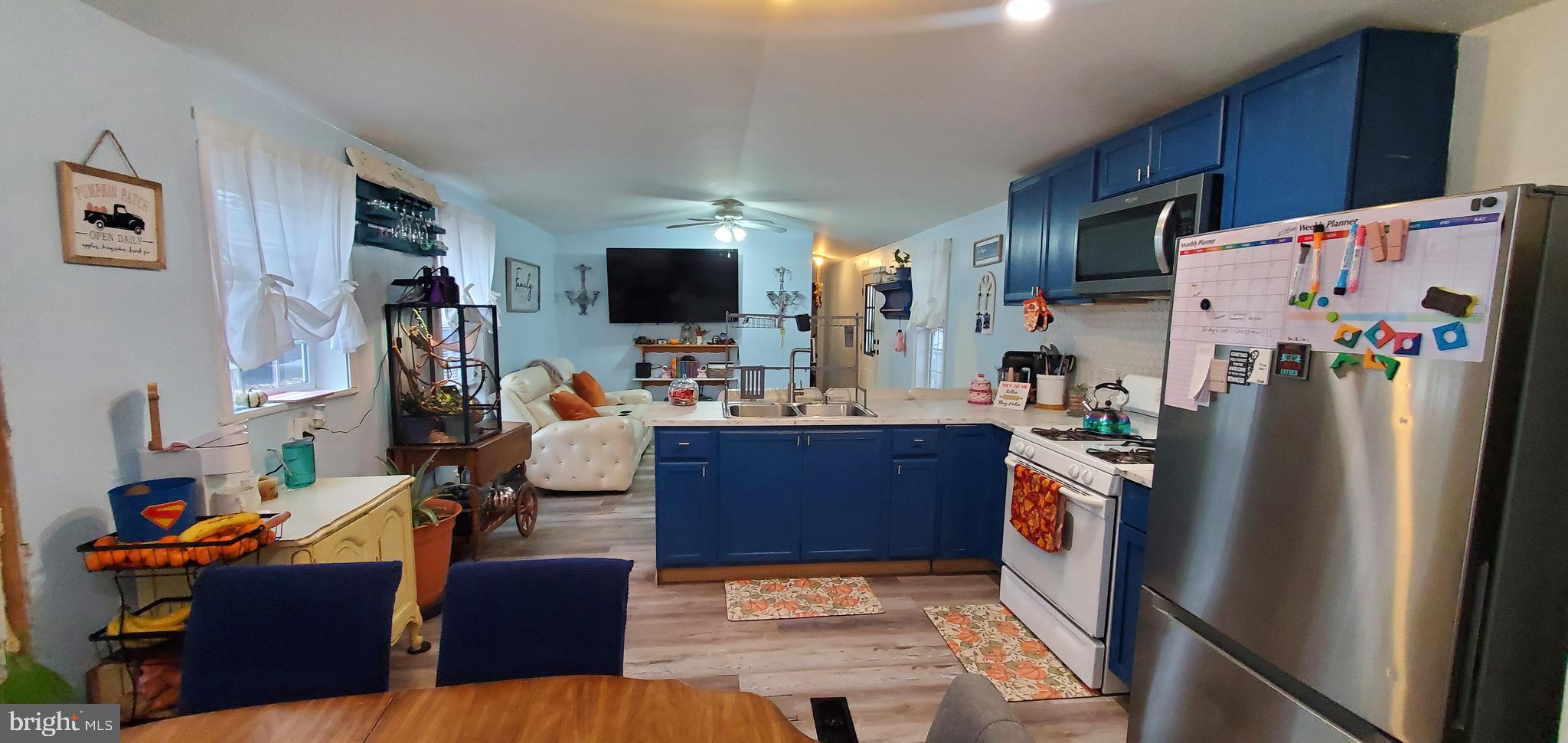 13 Springway Conowingo, MD 21918 - Photo 9 of 22 a kitchen with stainless steel appliances refrigerator stove microwave and sink