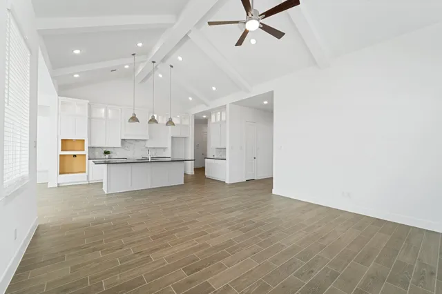 a view of kitchen with wooden floor