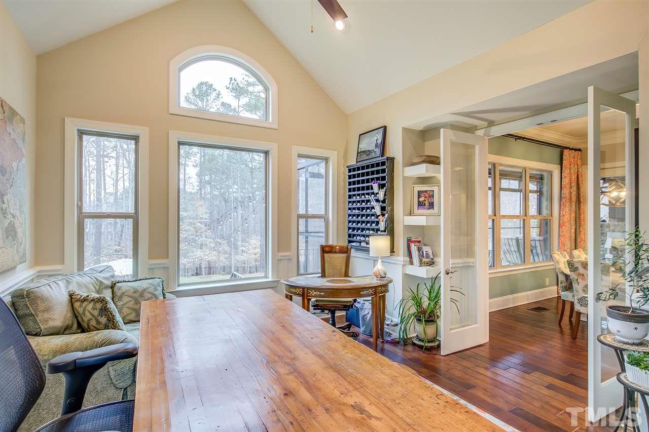 6037 Valencia Court Raleigh, NC 27614 - Photo 17 of 30 a living room with furniture and a large window