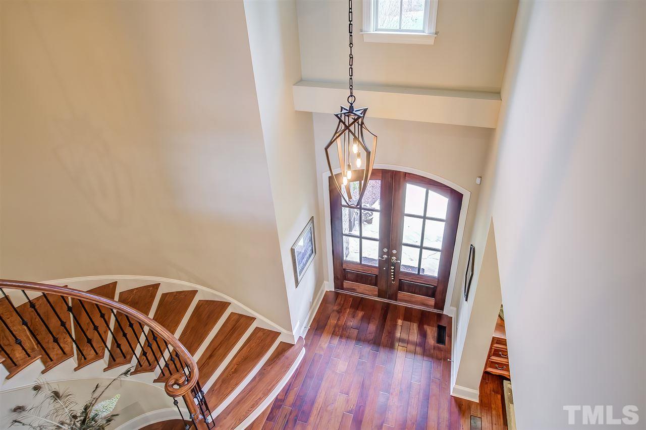 6037 Valencia Court Raleigh, NC 27614 - Photo 6 of 30 a view of entryway with wooden floor