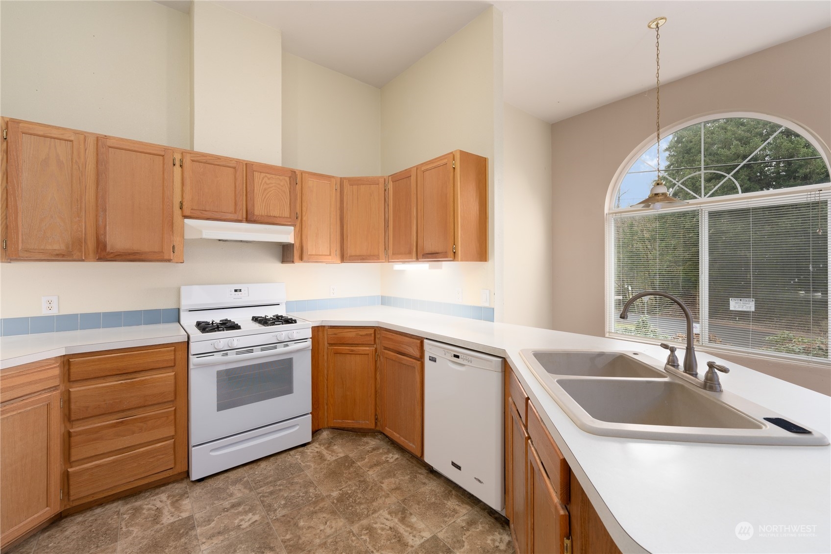 175 South Toutle Road Toutle, WA 98649 - Photo 8 of 29 a kitchen with a sink stove and cabinets