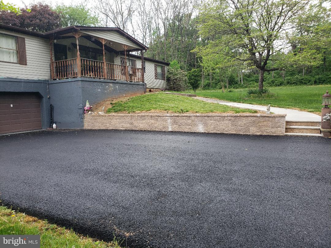 736 New Bridge Road Rising Sun, MD 21911 - Photo 2 of 32 Newer paved drive-way and stone wall