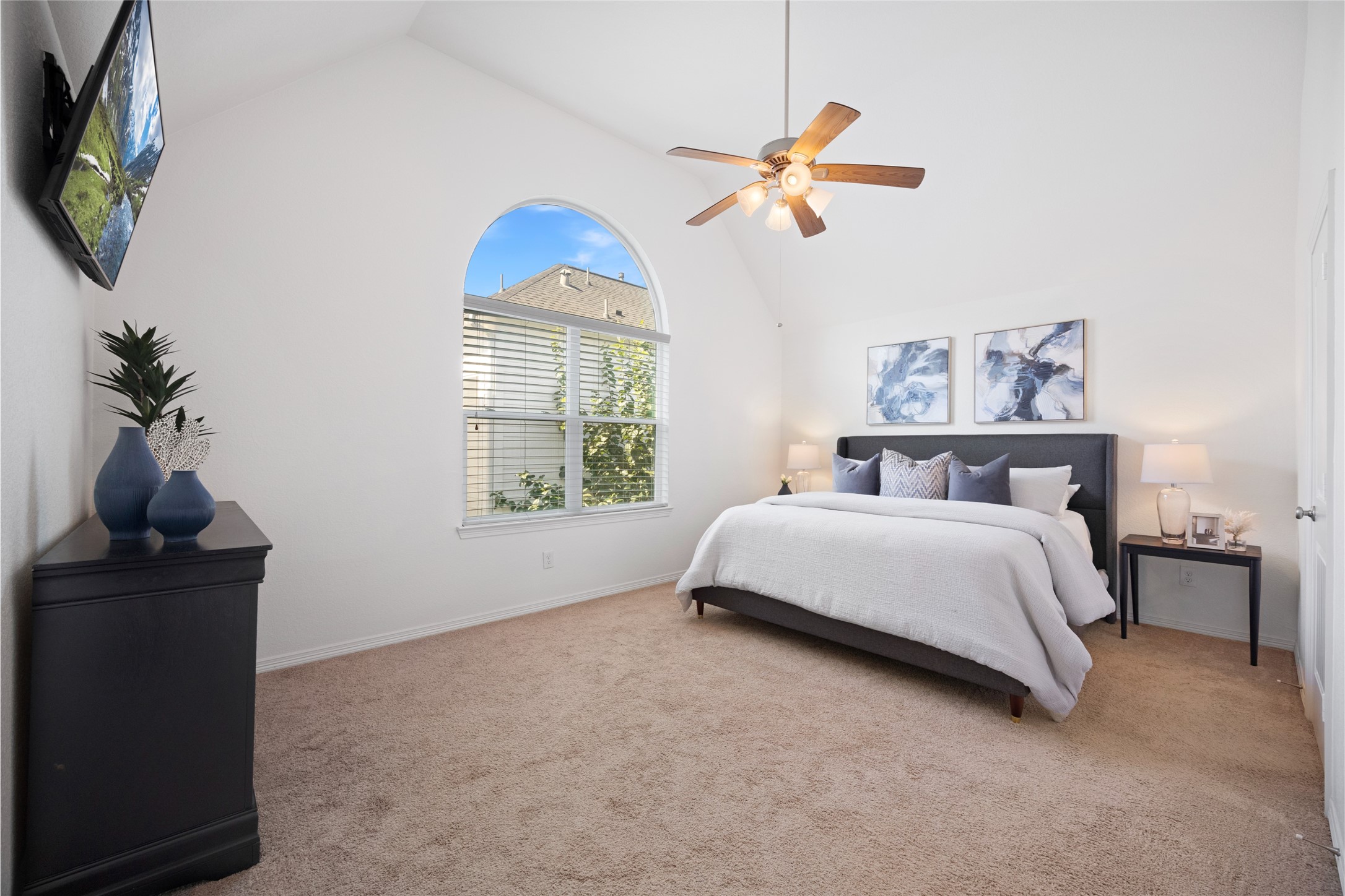 1172 West 17th Street Houston, TX 77008 - Photo 14 of 29 The HUGE primary bedroom can be found on the 3rd floor with two closets and a fully remodeled en-suite bath. This photo is staged with a king bed - which can easily fit in this room!