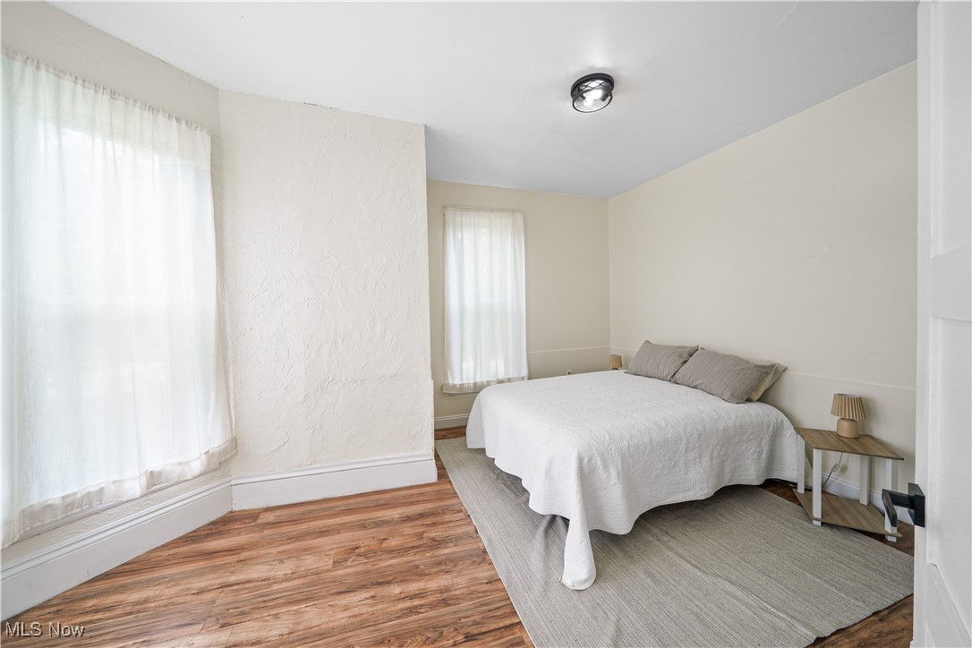 6118 Institute Road Rome, OH 44085 - Photo 11 of 27 Bedroom with wood finished floors and baseboards