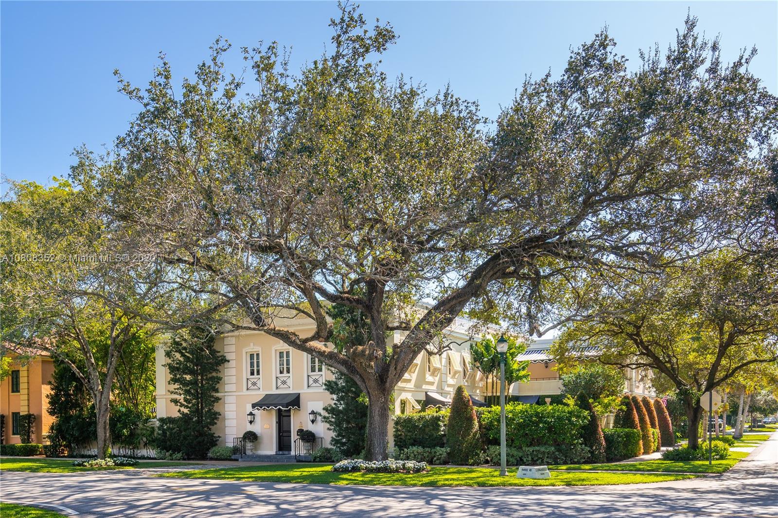 1030 Hardee Road Coral Gables, FL 33146 - Photo 1 of 55 a tree in the middle of a yard