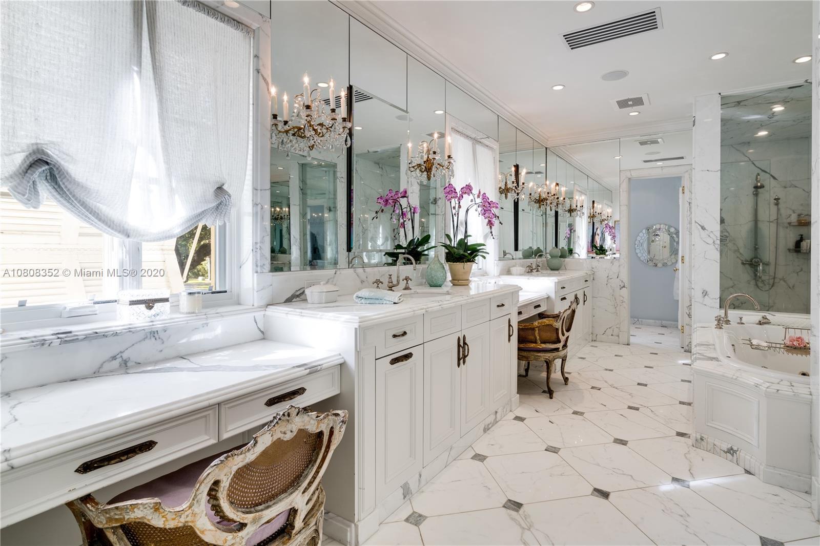 1030 Hardee Road Coral Gables, FL 33146 - Photo 22 of 55 a bathroom with a sink double vanity and a mirror