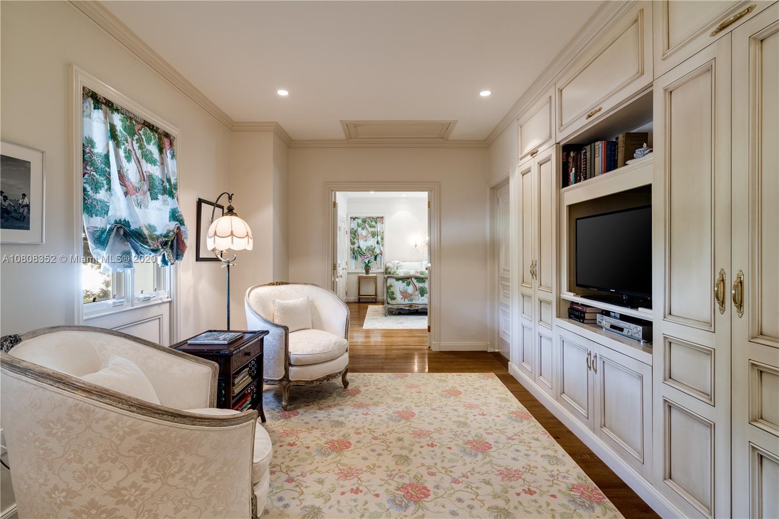 1030 Hardee Road Coral Gables, FL 33146 - Photo 26 of 55 a living room with furniture and a flat screen tv