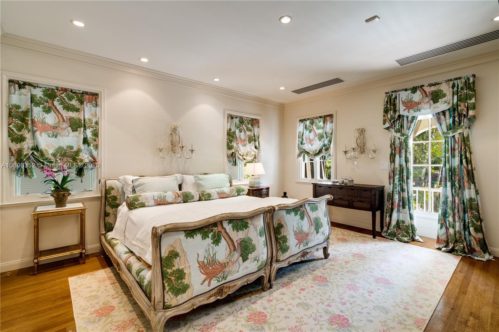 1030 Hardee Road Coral Gables, FL 33146 - Photo 27 of 55 a bedroom with a bed and a couch