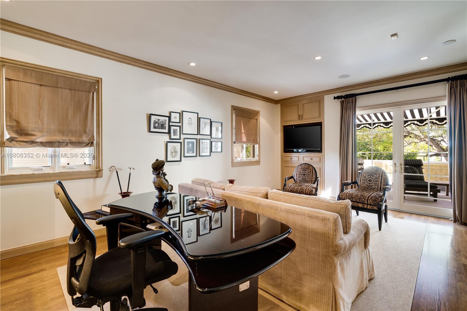 1030 Hardee Road Coral Gables, FL 33146 - Photo 29 of 55 a living room with furniture and a large window
