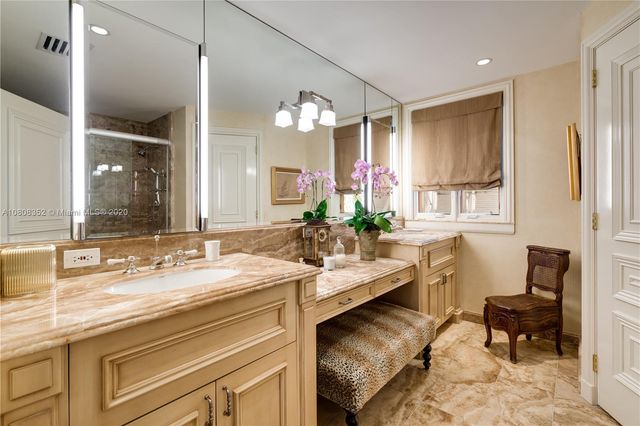 a view of a two chairs with a porch