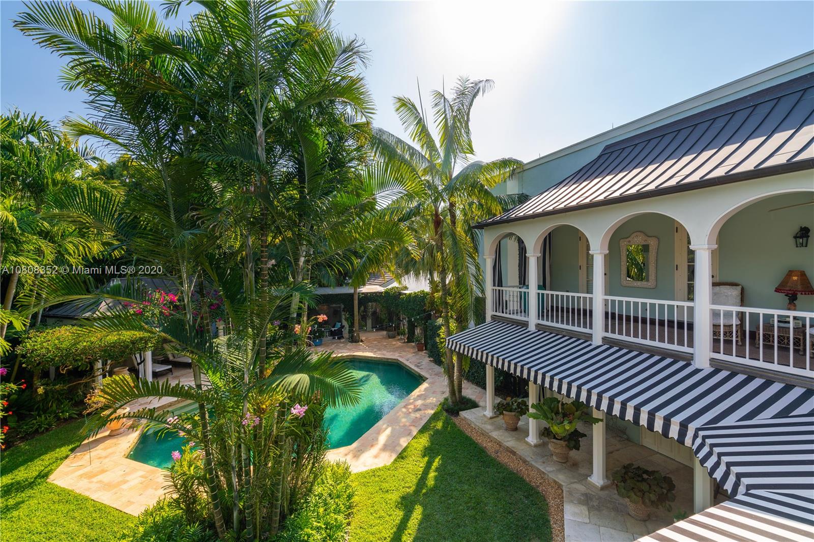 1030 Hardee Road Coral Gables, FL 33146 - Photo 34 of 55 a view of a house with a yard and deck