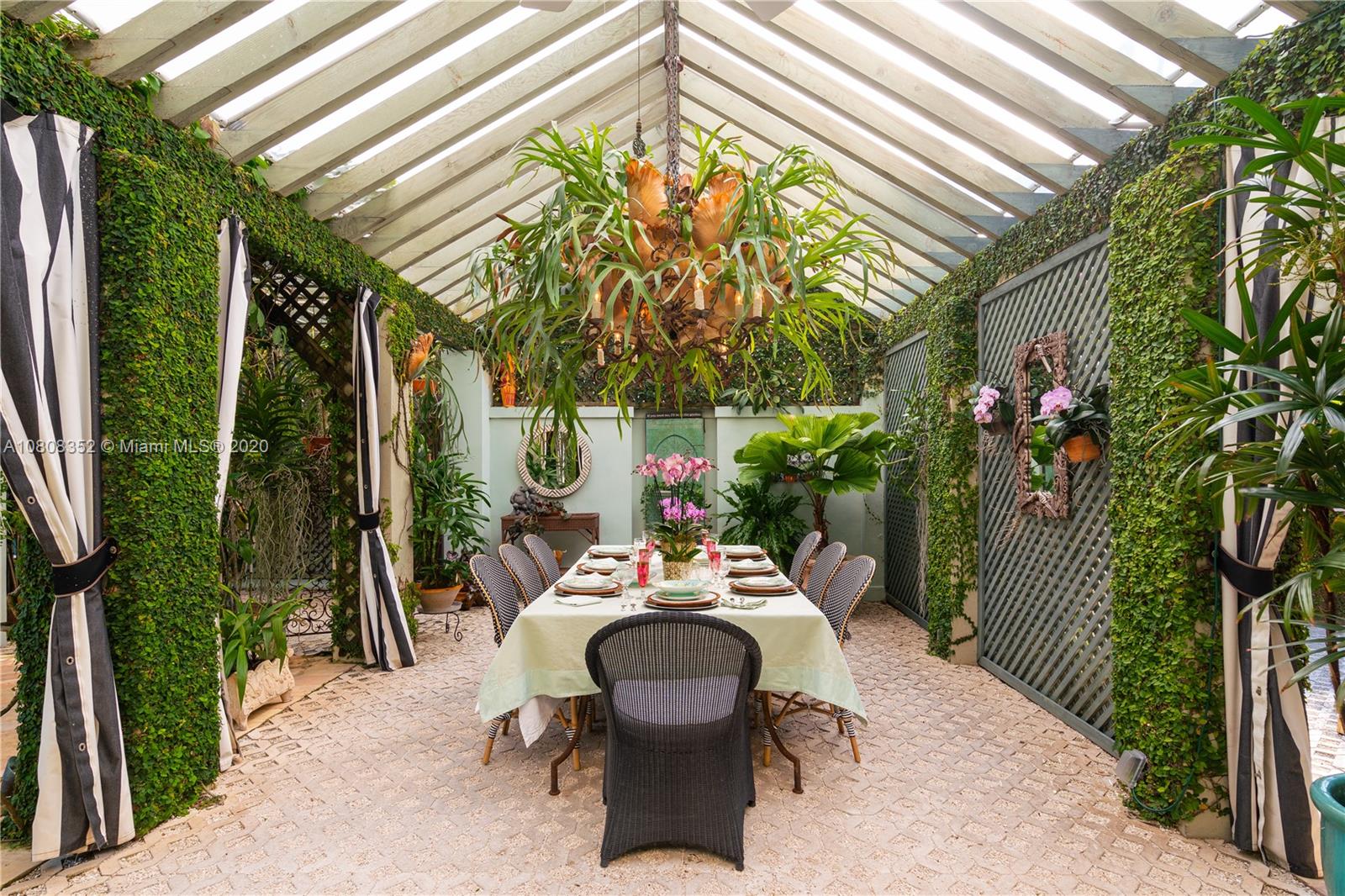 1030 Hardee Road Coral Gables, FL 33146 - Photo 43 of 55 a outdoor living space with furniture and garden view