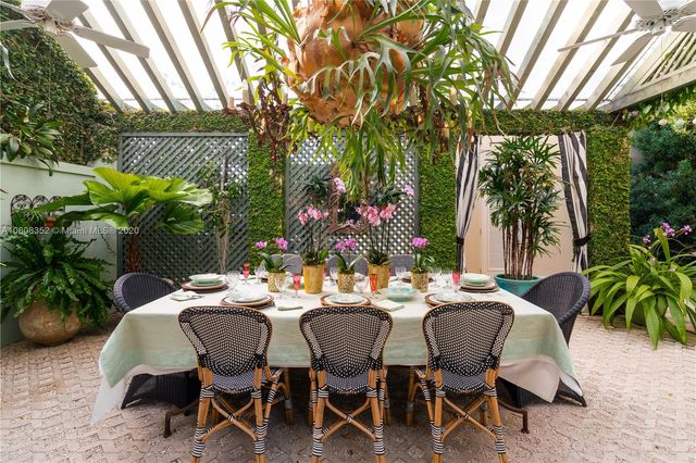 a view of an empty room with a flat screen tv