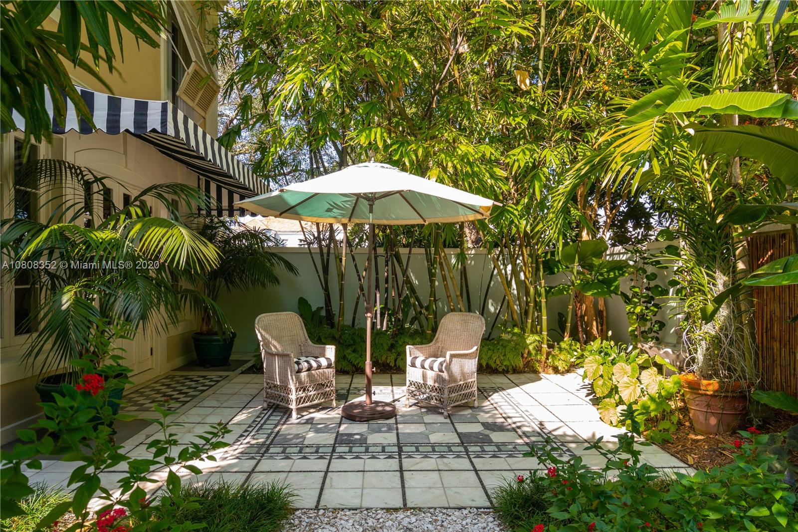 1030 Hardee Road Coral Gables, FL 33146 - Photo 46 of 55 a view of outdoor space yard deck patio and outdoor kitchen