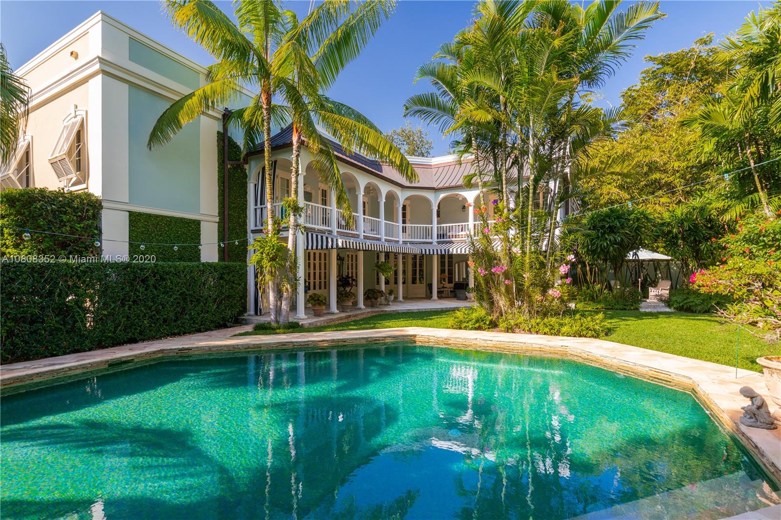 1030 Hardee Road Coral Gables, FL 33146 - Photo 49 of 55 a front view of a house with a yard