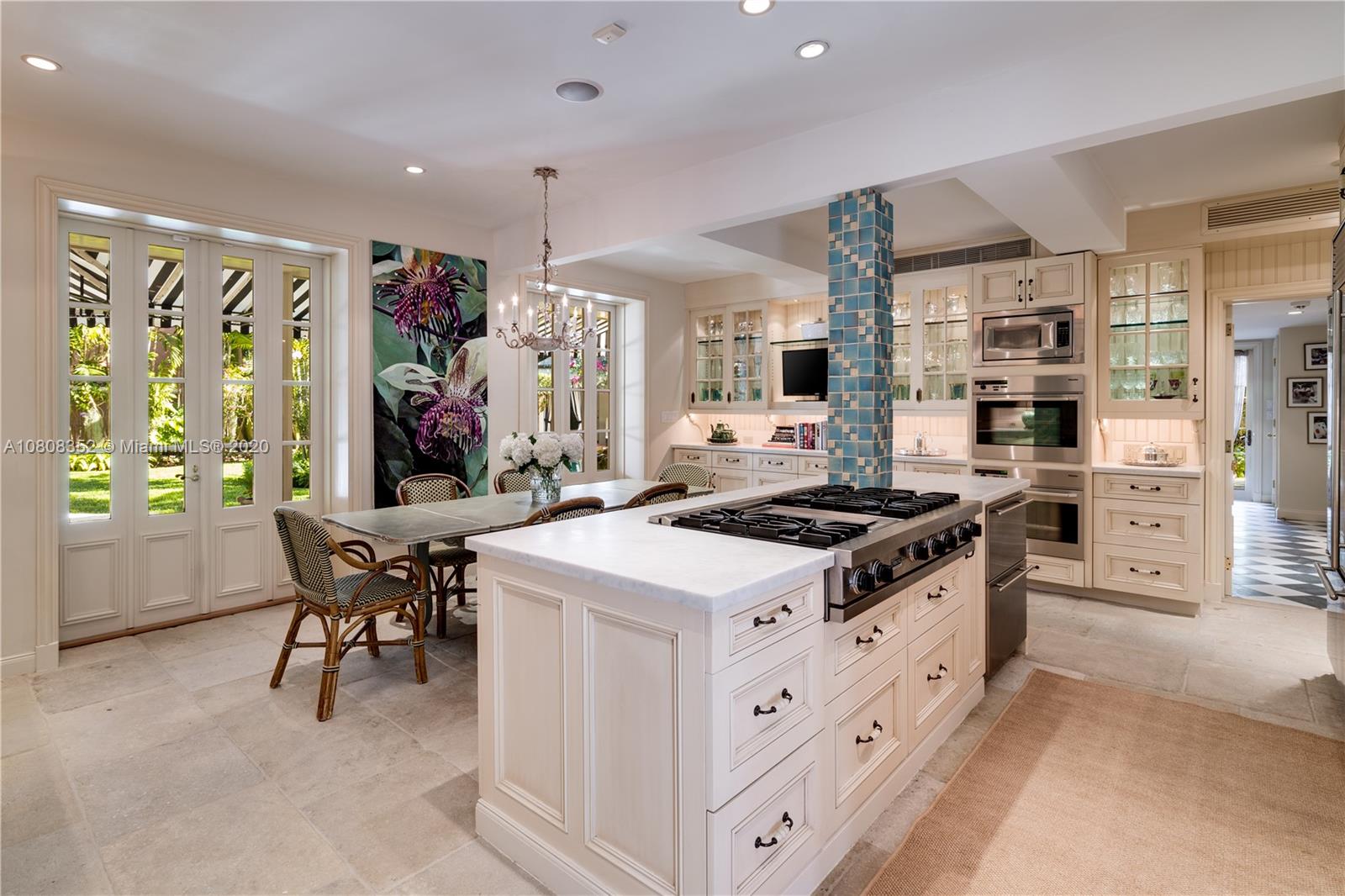1030 Hardee Road Coral Gables, FL 33146 - Photo 10 of 55 The kitchen is surrounded by natural light