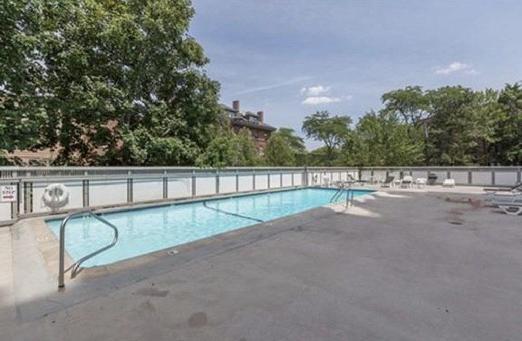 19 Winchester Street, Unit 801 Brookline, MA 02446 - Photo 16 of 19 a view of swimming pool with a yard