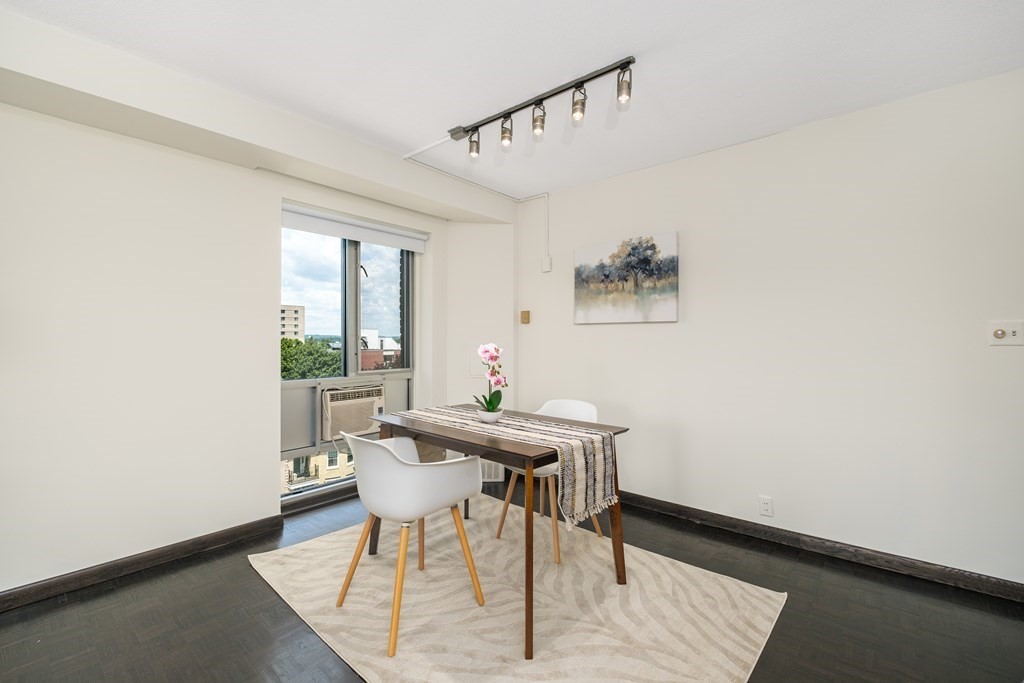 19 Winchester Street, Unit 801 Brookline, MA 02446 - Photo 5 of 19 a view of a dining room with furniture and window