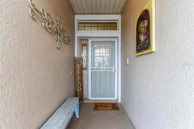 a view of a hallway with entryway